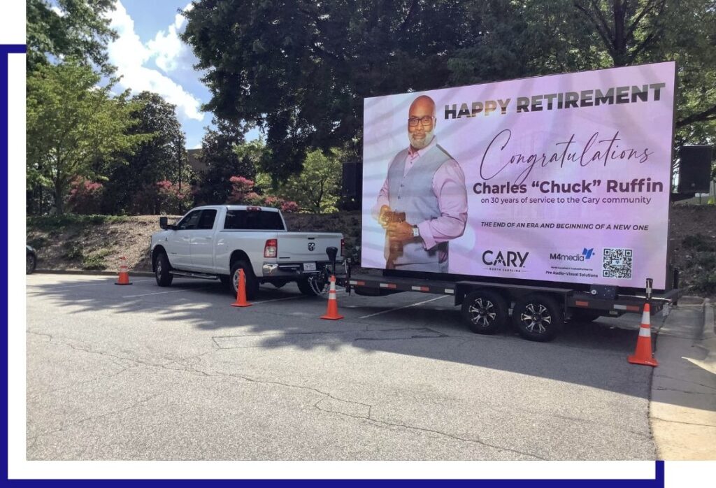 Image of mobile billboard with birthday party image on it