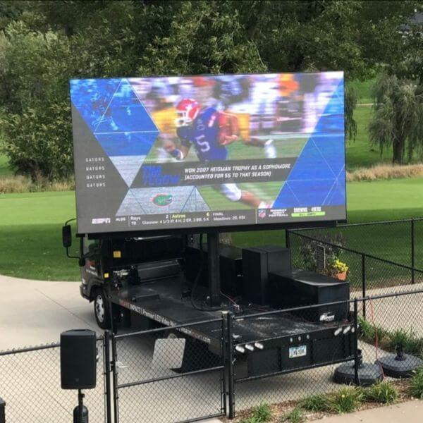 mobile media billboard showing images of sports